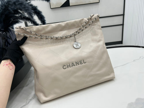 CHANEL LARGE 42 HANDBAG IN BEIGE CREAM CALFSKIN SILVER HARDWARE