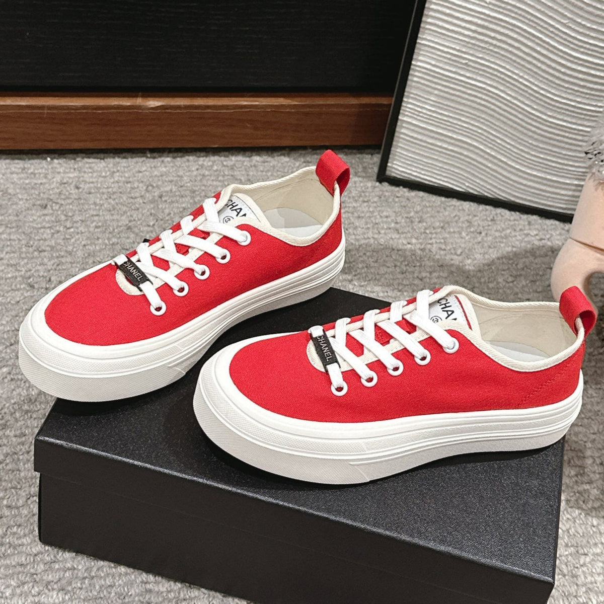CHANEL LACE-UP SNEAKERS IN CHERRY RED CANVAS